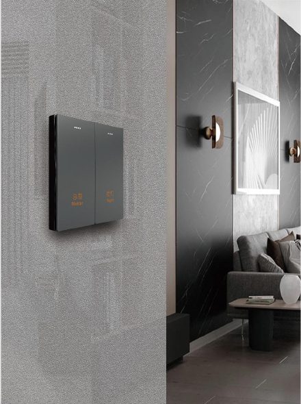 Wall-mounted smart room control switch panel in a hotel room